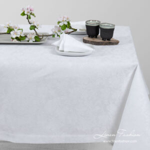 White linen tablecloth in flowers pattern