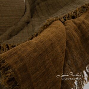 Brunt mønstret tosidig linpledd med frynser 12 Brunt mønstret tosidig linpledd med frynser