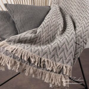 Grey zigzag patterned linen blanket with fringes