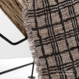 Linen blanket with fringes, sand colour side with dark grey grids