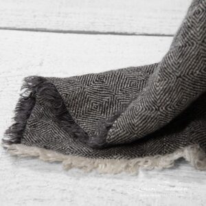 Grey coloured 100% linen bedspread.