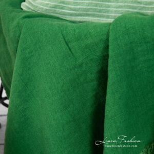 linen green throw, heavy feel.