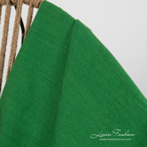 linen green throw, washed.