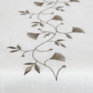 Natural linen table runner with white middle, floral stitching