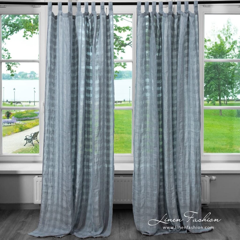 Bluish grey linen curtain in transparent checks