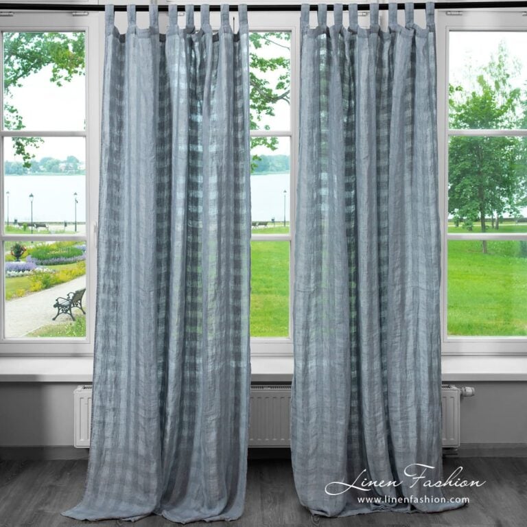 Bluish grey linen curtain in transparent checks