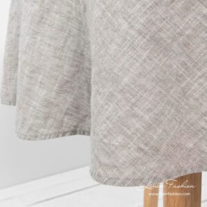 Light grey colored round tablecloth, astra.