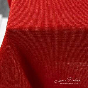 Linen tablecloth red with gold lurex yarns.