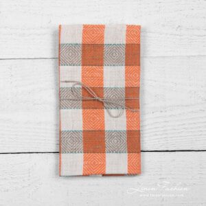 Linen kitchen towel in check and rhombuses pattern