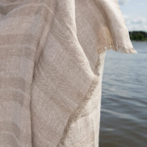 Linen beach towel in sand colour stripes, with fringe