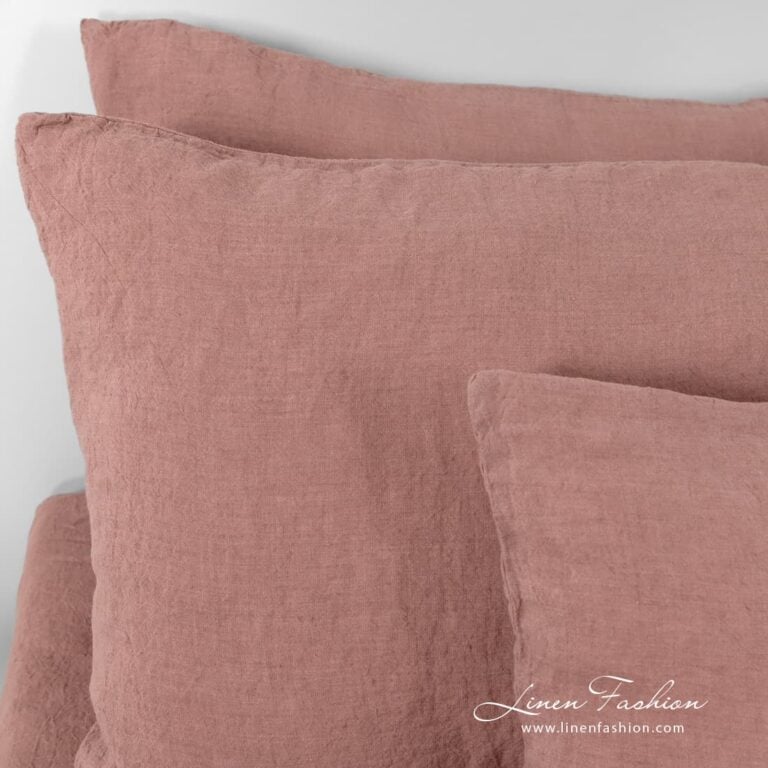 Washed bed linen pillow cases with flaps.