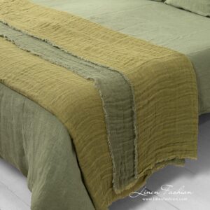 Linen green bedspread washed in different sizes.