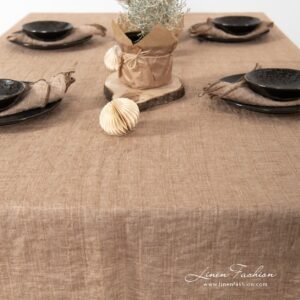 Brown tablecloth of 100% linen fabric.