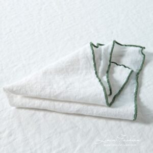 ARVO white linen napkin with green border