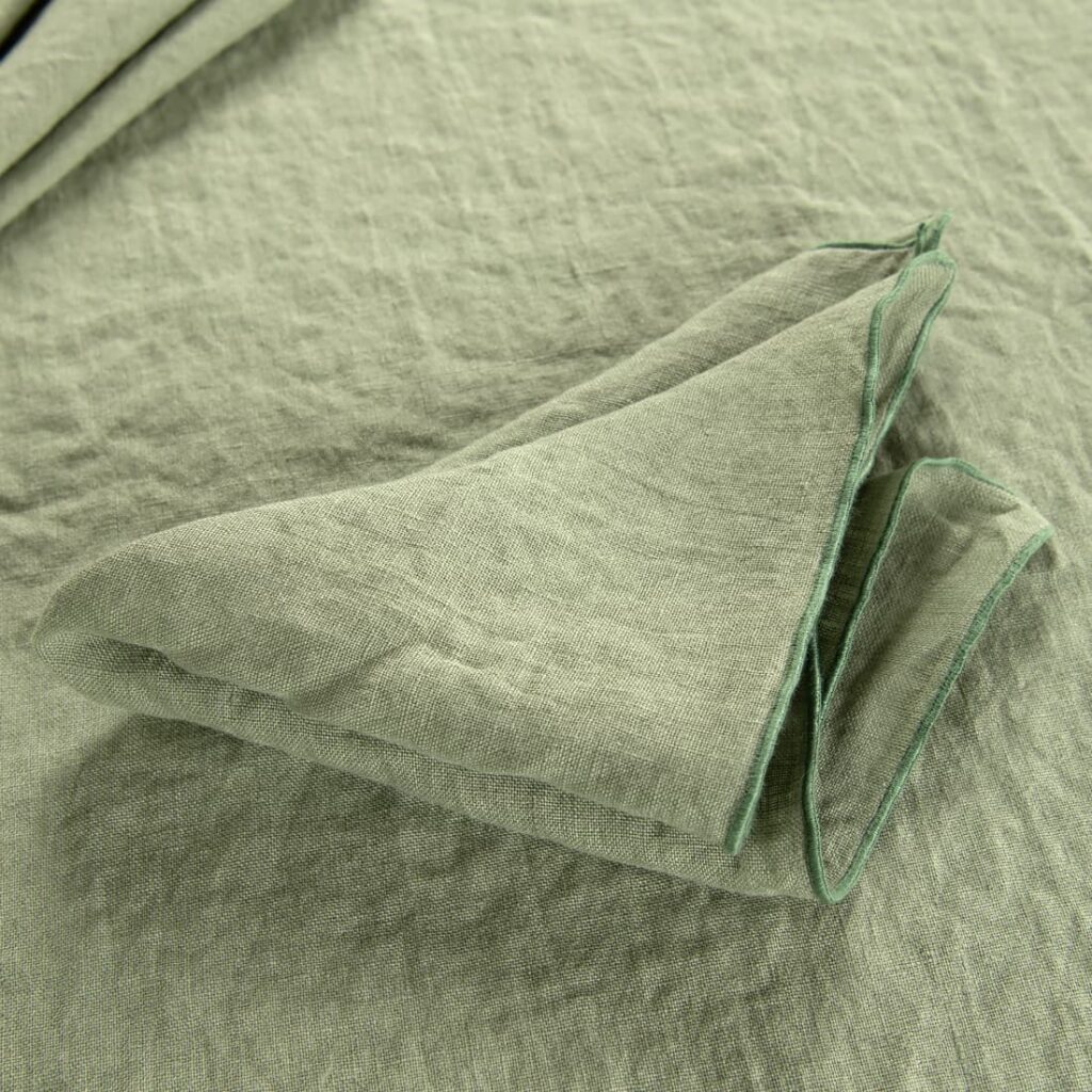 green linen napkin with babylock
