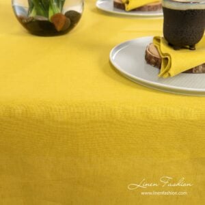 Yellow colored tablecloth, luna.