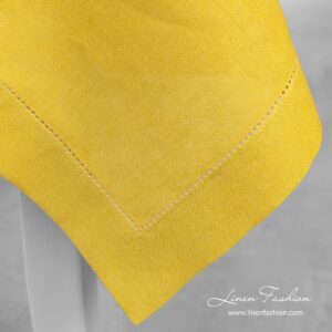 Linen-cotton yellow tablecloth.