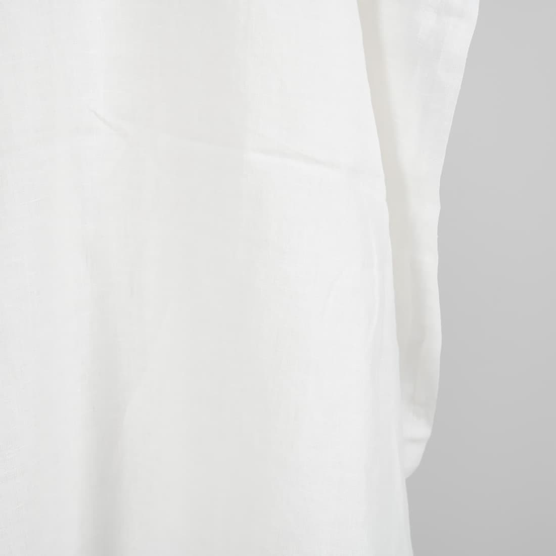 Washed linen fabric in off-white edge