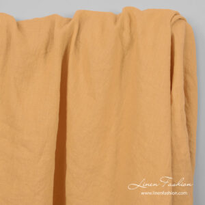 Peach yellow color linen fabric, washed