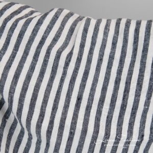 100% linen fabric in navy stripes, washed.
