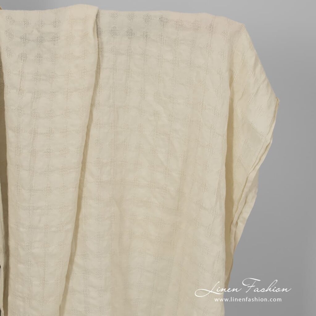 Vanilla colour rhombus linen fabric, washed.