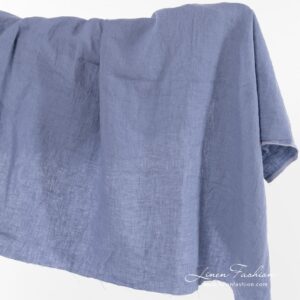 Dusty blue linen fabric, washed.