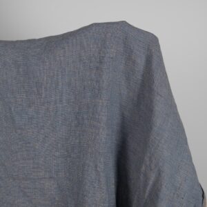 Linen Fabric Brownish Blue Color Washed for sewing clothes and home textiles close up detail view