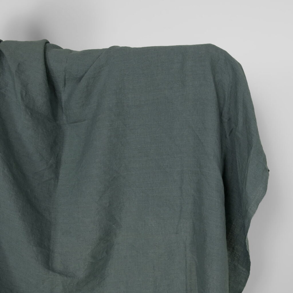 Washed linen fabric in balsam green colour
