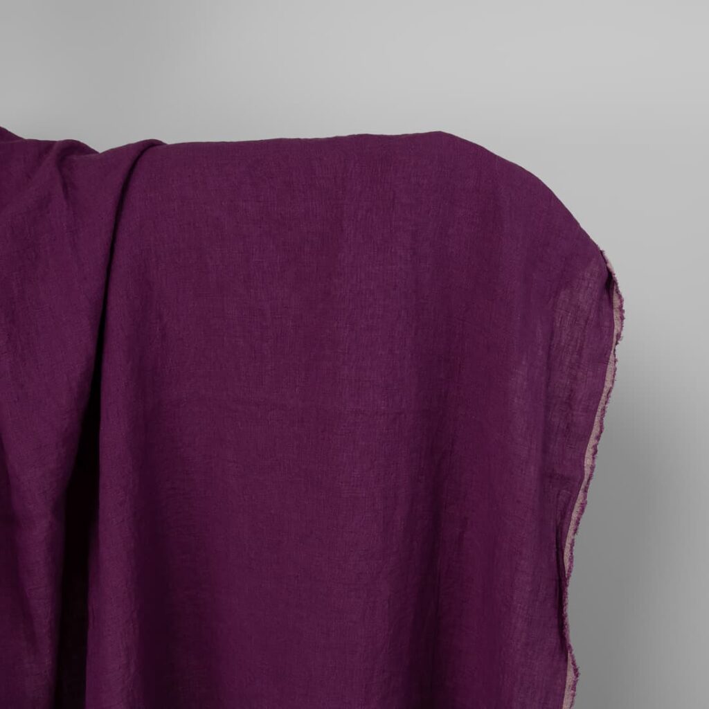 Washed linen fabric in red-violet