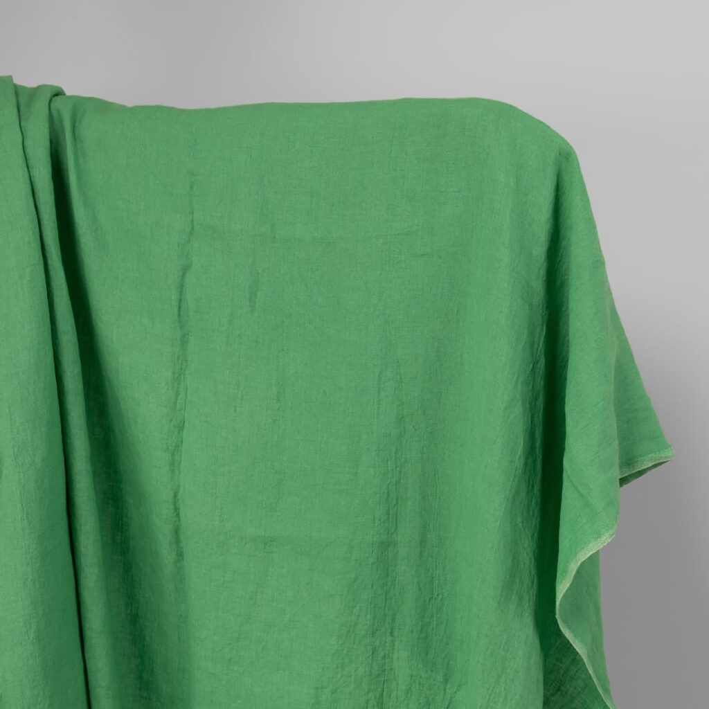 Washed linen fabric in spinach green