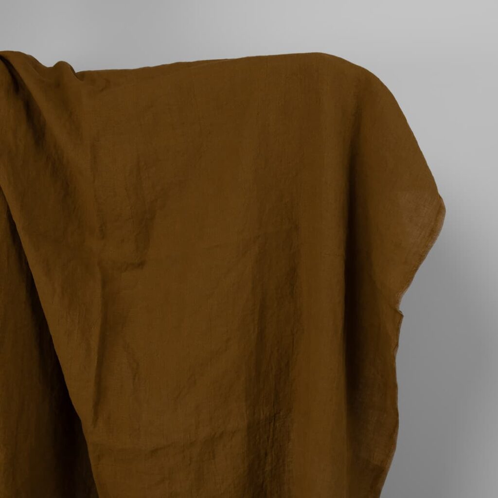Washed linen fabric in golden brown