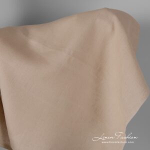 Linen fabric in light sand colour.