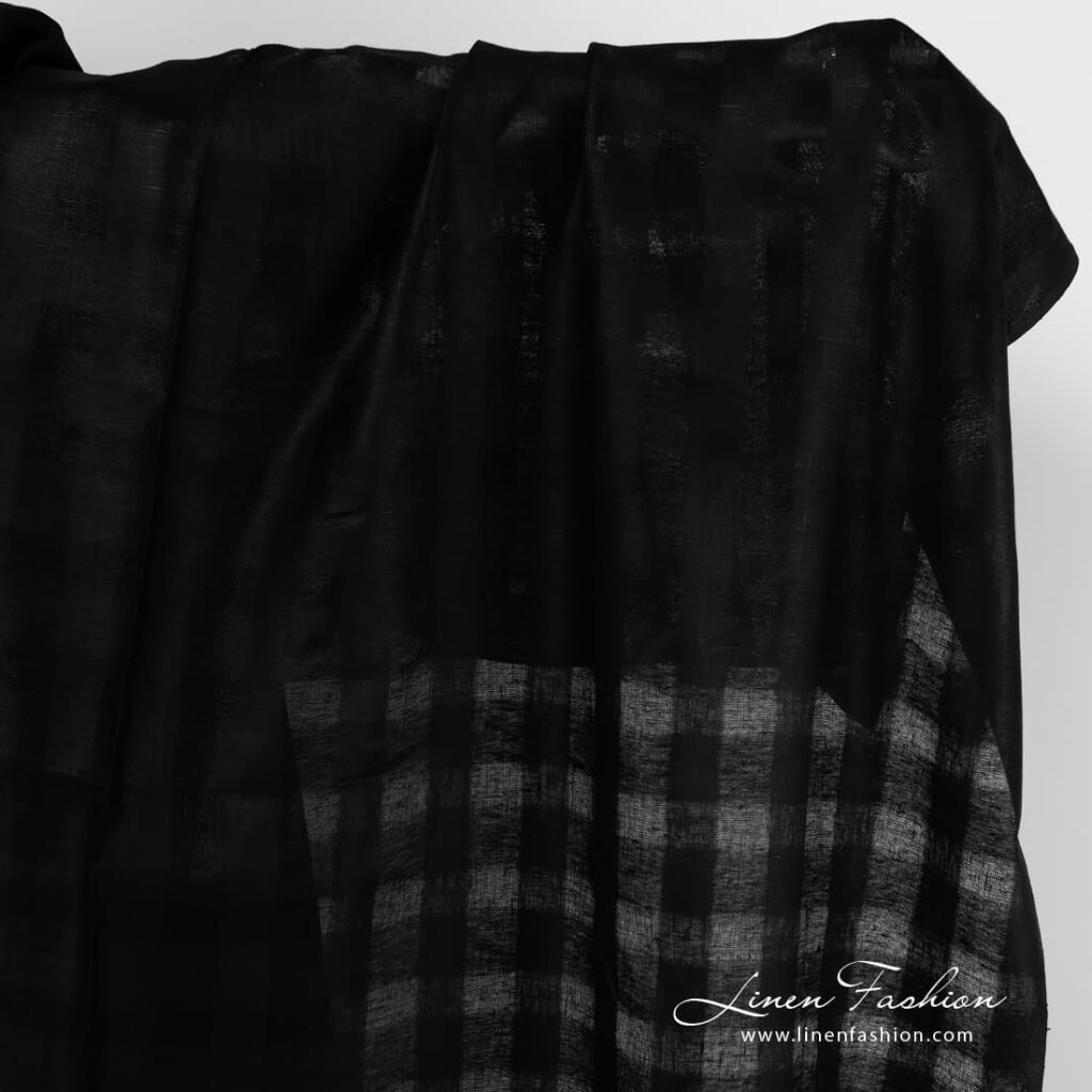 Black linen fabric with open weave checks.