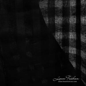 Black dyed linen fabric with checks.