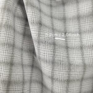 Linen cotton fabric white with black checks close up detail with measurements