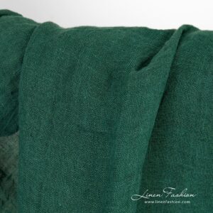Transparent forest green linen fabric
