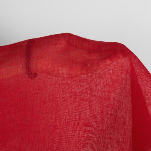 Bright red transparent linen fabric close up detail