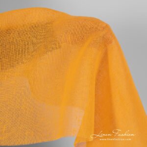 Transparent linen fabric in apricot yellow, perfect for curtains, scarves and shawls