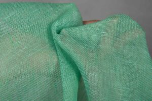 Mintgrønt linstoff gjennomsiktig