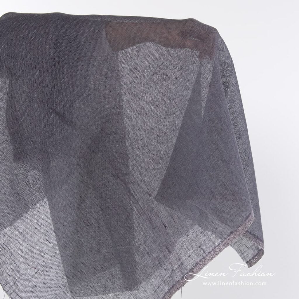 Linen fabric in dusty plum colour.