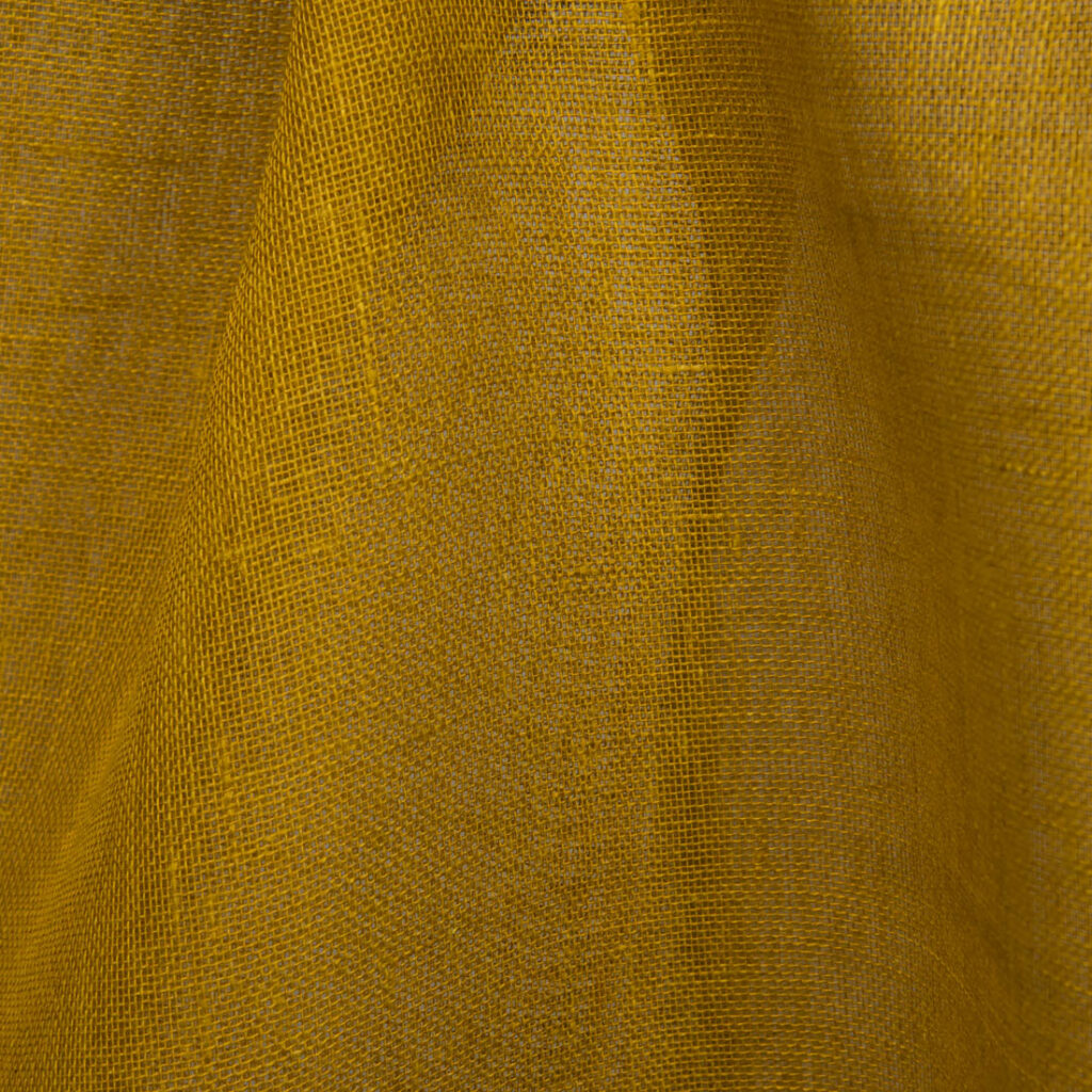 Pure linen fabric gauze in deep yellow color.
