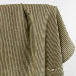 Linstoff i grønne og gulaktige striper vasket 10 100% linen fabric in stripes.