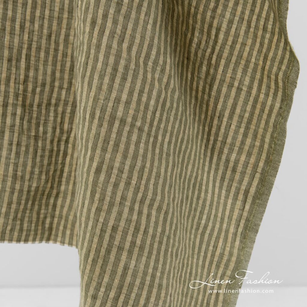Linstoff i grønne og gulaktige striper vasket 3 Washed linen fabric in green stripes.