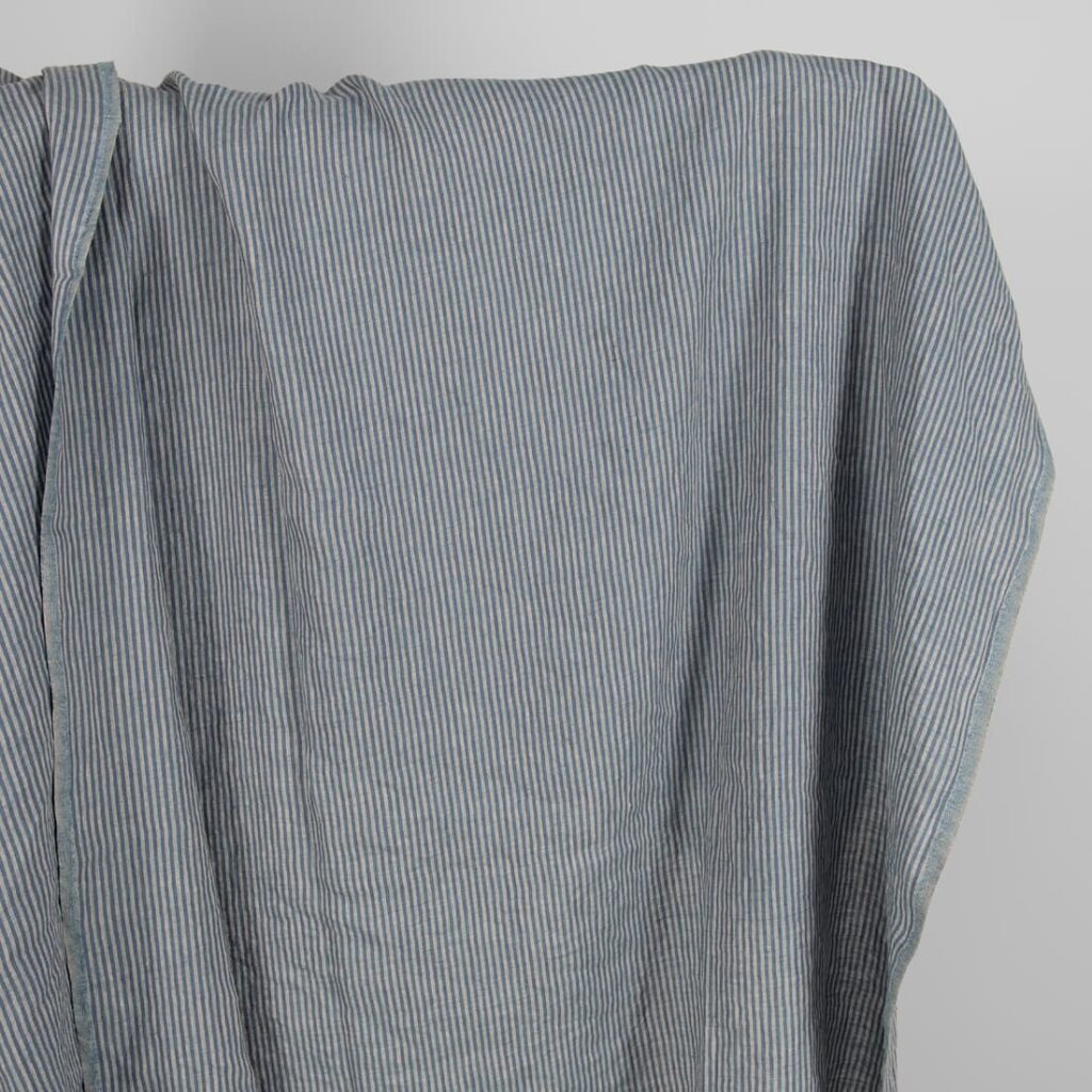 Washed linen fabric with blue stripes