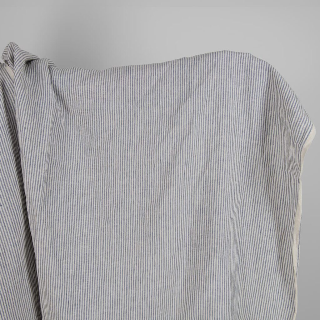 Washed linen fabric with brownish and blueish grey stripes