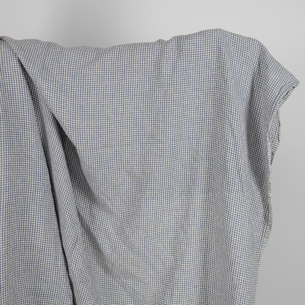 Washed linen fabric with small blue and brownish checks