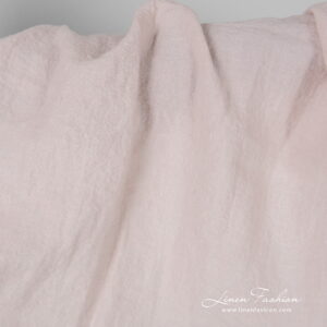 Wide light pink linen fabric, washed