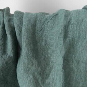 Washed green melange linen fabric