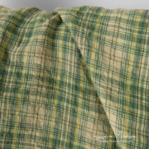 Washed green checked linen fabric