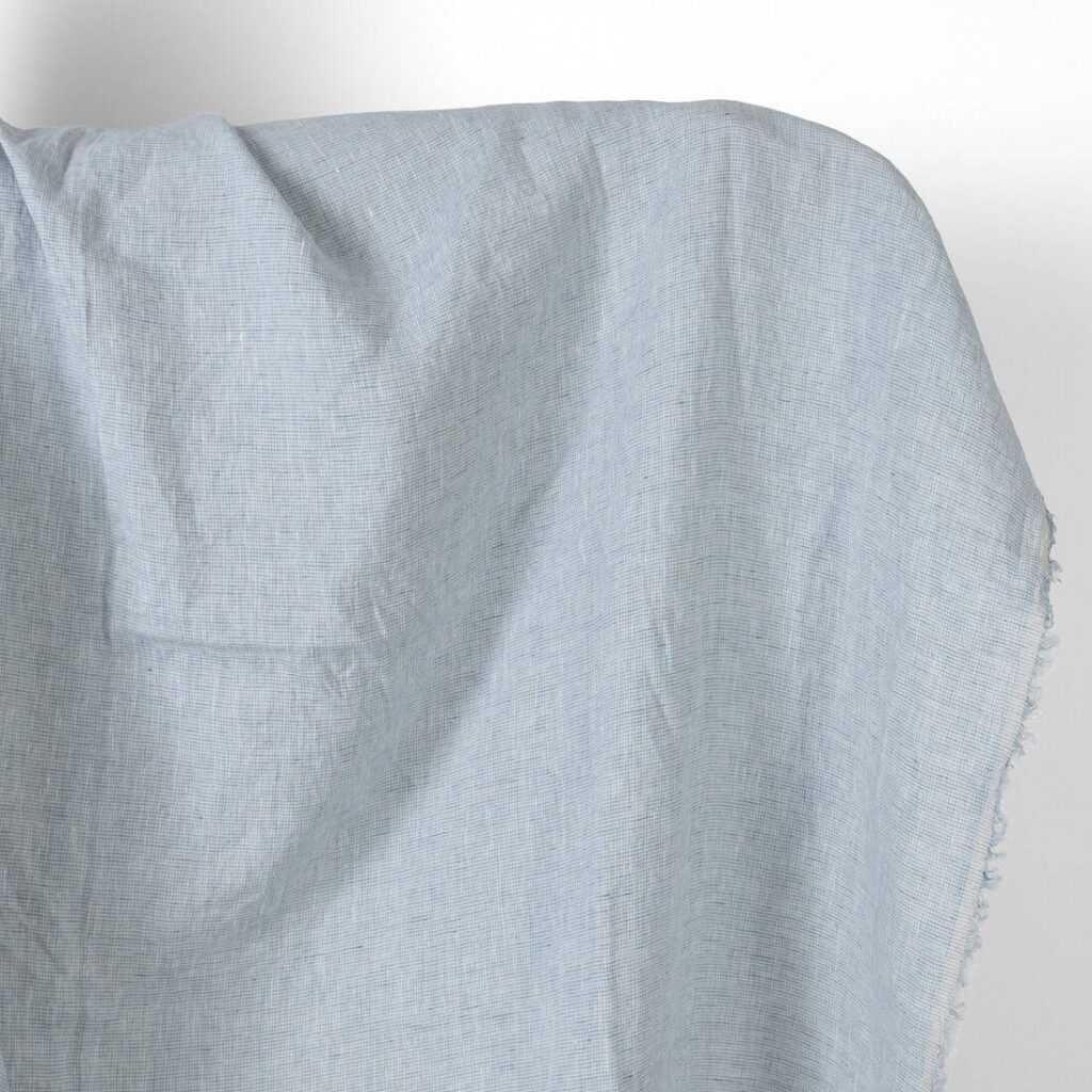 Washed linen fabric light blue melange